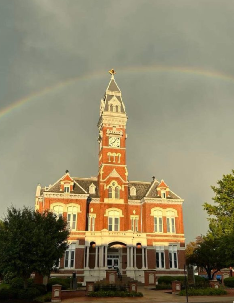 Courthouse with rainbow in background